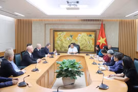 越南政府副总理阮志勇会见德越友好协会代表团。图自越通社