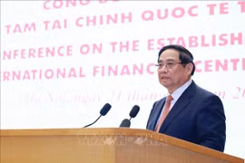 越南政府总理范明政发表讲话。图自越通社