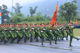 人民公安人员参加庆祝国庆阅兵和游行彩排活动。图自越通社