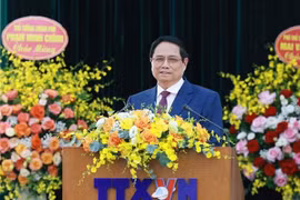 越共中央政治局委员、政府党委书记、政府总理范明政发表讲话。图自越通社