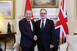 越共中央总书记苏林和英国首相基尔·斯塔默。图自越通社