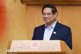 越南政府总理范明政主持召开政府专题会议。图自越通社