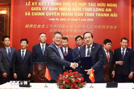 签约仪式。图自越通社