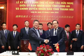 签约仪式。图自越通社
