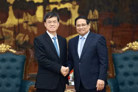 越南政府总理范明政会见中国退役军人事务部部长裴金佳。图自越通社