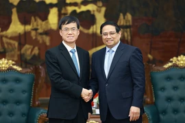 越南政府总理范明政会见中国退役军人事务部部长裴金佳。图自越通社