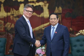 南政府总理范明政会见了美国惠普集团（HP）负责数字化转型与供应链事务全球高级副总裁安托万·科林（Antoine Colin）。图自越通社