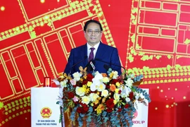 越南政府总理范明政发表讲话。图自越通社