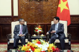 越南国家主席梁强会见印尼驻越大使丹尼•阿卜迪。图自越通社