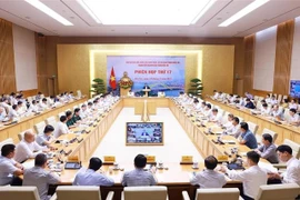 会议场景。图自越通社