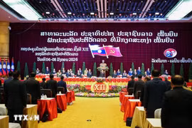 老挝人民革命党第十二次全国代表大会闭幕式。图自越通社