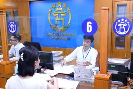 民众和企业对建设部门行政手续办理情况的满意度指数达100%。图自越通社