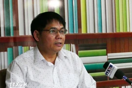 在老越资企业协会副主席黄文军。图自越通社