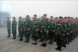 老挝人民军代表团赴越参加九·二国庆阅兵活动。图自越通社