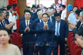 越共中央政治局委员、政府党委书记、政府总理范明政出席越共科学与技术部第一次代表大会。图自越通社