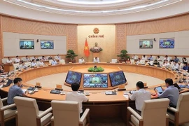 会议现场。图自越通社