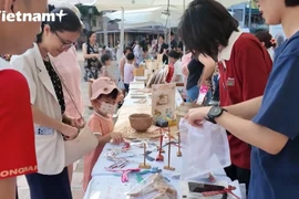 用传统艺术唤醒文化认同 引导孩子认知越南本色