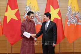 越南国家主席梁强和不丹国王吉格梅·凯萨尔·纳姆耶尔·旺楚克。图自越通社