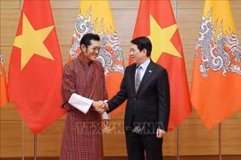 越南国家主席梁强和不丹国王吉格梅·凯萨尔·纳姆耶尔·旺楚克。图自越通社