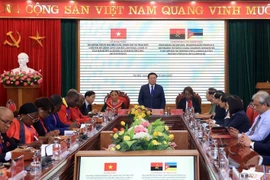 2025年安哥拉人民解放运动党(MPLA)和莫桑比克解放阵线党(FRELIMO)领导、管理干部专题研究、考察与交流活动项目开幕式。图自越通社