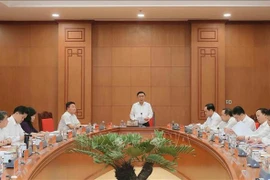 会议场景。图自越通社