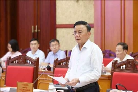 越共中央书记处常务书记陈锦秀主持越共十四大服务组织小组第四次会议。图自越通社