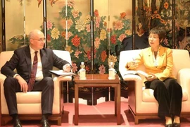 越通社与塔斯社加强新时期业务合作