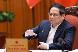 越共中央政治局委员、政府党委书记、政府总理范明政发表讲话。图自越通社