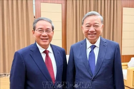 越共中央总书记苏林会见中国国务院总理李强。图自越通社