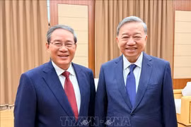 越共中央总书记苏林会见中国国务院总理李强。图自越通社