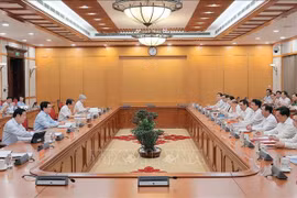 国家主席梁强主持会议。图自越通社