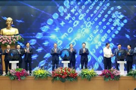 国家法律门户网站上线仪式在政府驻地举行。图自越通社