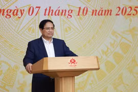 越南政府总理范明政发表讲话。图自越通社
