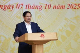越南政府总理范明政发表讲话。图自越通社