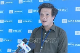 联合国教科文组织信息中心副总经理丁德煌。图自越通社