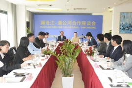 会议场景。图自越通社