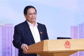 越南政府总理范明政发表讲话。图自越通社