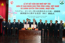 永隆省人民委员会与日本爱媛县政府举行了合作备忘录签署仪式。图自越通社