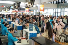 内排机场T1航站楼越南航空值机区。图自越通社