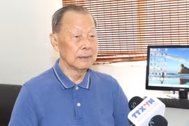毕生致力于研究胡志明主席革命生涯和越南风土人情的学者李明汉。图自越通社