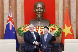 越南国家主席梁强会见新西兰议会议长格里·布朗利。图自越通社