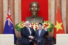 越南国家主席梁强会见新西兰议会议长格里·布朗利。图自越通社