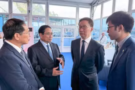 越南政府总理范明政会见中国国家副主席韩正。图自越通社