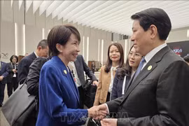 越南国家主席梁强与日本首相高市早苗会晤。图自越通社