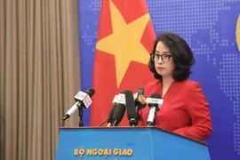 越南外交部发言人范秋姮主持外交部例行记者会。图自越通社