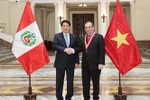 越南国家主席梁强会见秘鲁最高法院院长阿雷瓦洛 图自越通社