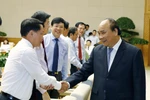 越南政府总理阮春福会见记者协会代表庆祝越南革命新闻日（组图）