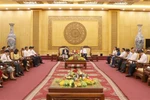 越南宁平省新闻机构与老挝《共产主义》杂志加强交流活动