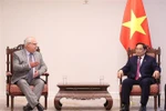 范明政总理会见美国墨菲石油公司首席执行官罗格·詹金斯