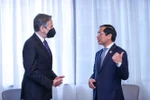  越南外交部部长会见美国国务卿和美国国家安全顾问